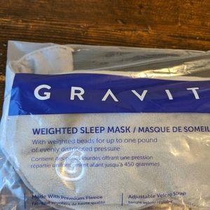 Gravity weighted sleep mask